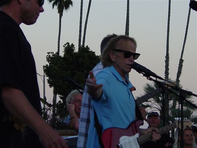 Beach Boy Al Jardine and Chuck Williams sing “Surfin USA”.